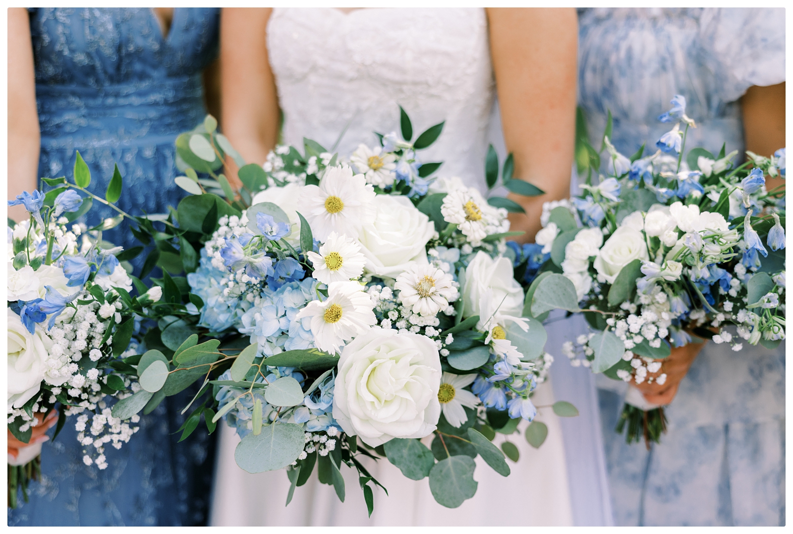 bride and bridesmaids blue and white bouquets